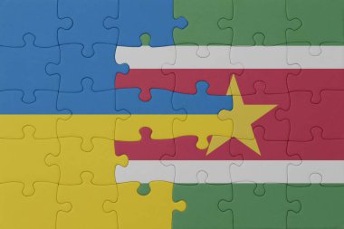 Ulusal Ukrayna bayrağı ve surinam bulmacası. Makro. Kavram. 3d illüstrasyon