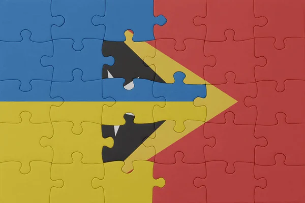 Παζλ Την Εθνική Σημαία Της Ukraine Και Ανατολικά Timor Μακροέννοια — Φωτογραφία Αρχείου