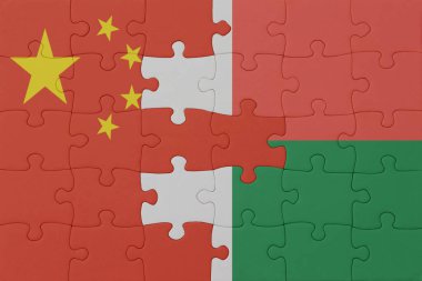 Ulusal Macagara ve Çin bayrağı bulmacası. Makro. Kavram. 3d illüstrasyon