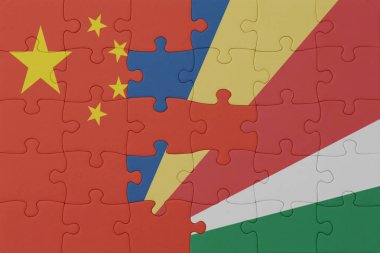 Seyşel bayrağı ve Çin 'in ulusal yapbozu. Makro. Kavram. 3d illüstrasyon