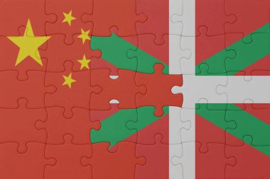 Bask ülkesinin ulusal bayrağı ve Çin 'in bulmacası. Makro. Kavram. 3d illüstrasyon