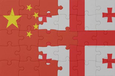 Gürcistan ve Çin 'in ulusal bayrağıyla bulmaca. Makro. Kavram. 3d illüstrasyon