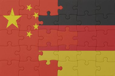 Alman bayrağı ve Çin 'in ulusal yapbozu. Makro. Kavram. 3d illüstrasyon