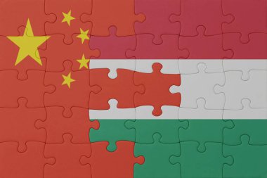 Hungary ve Çin 'in ulusal bayrağıyla bulmaca. Makro. Kavram. 3d illüstrasyon