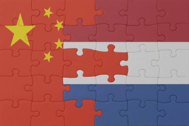 Hollanda ve Çin 'in ulusal bayrağıyla ilgili bulmacalar. Makro. Kavram. 3d illüstrasyon