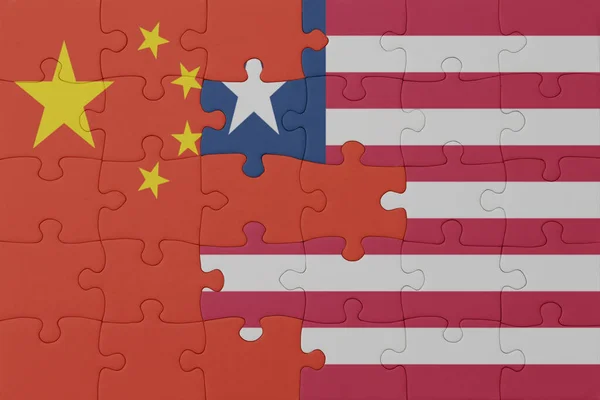 Puzzle Con Bandiera Nazionale Liberia Cina Macro Concept Illustrazione — Foto Stock