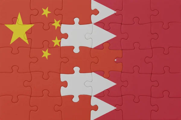 バーレーンと中国の国旗のパズルです マクロ コンセプト 3Dイラスト — ストック写真
