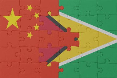 Guyana ve Çin ulusal bayrağının yapbozu. Makro. Kavram. 3d illüstrasyon