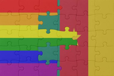 Gökkuşağı bayrağı eşcinsellik gururu ve kamerun bulmacası. Makro. Kavram. 3d illüstrasyon