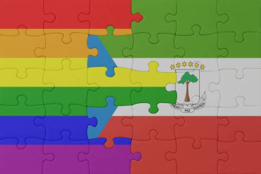 Gökkuşağı bayrağı eşcinsellik gururu ve ekvator Ginesi 'nin bulmacası. Makro. Kavram. 3d illüstrasyon