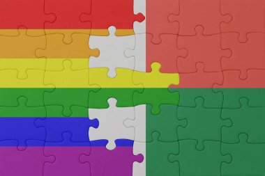 Gökkuşağı bayrağı eşcinsellik gururu ve madagaskar bulmacası. Makro. Kavram. 3d illüstrasyon