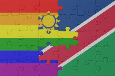 Gökkuşağı bayrağı eşcinsellik gururu ve namibya yapbozu. Makro. Kavram. 3d illüstrasyon