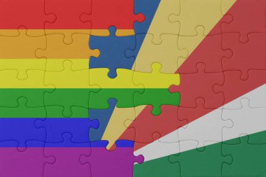 Gökkuşağı bayrağı eşcinsellik gururu ve Seyşeller 'in bulmacası. Makro. Kavram. 3d illüstrasyon