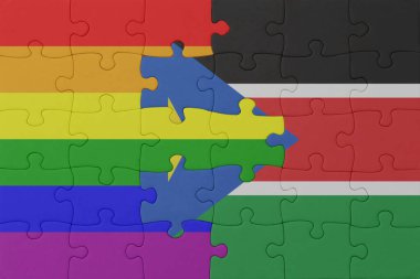 Gökkuşağı bayrağı eşcinsellik gururu ve Güney Sudan 'ın bulmacası. Makro. Kavram. 3d illüstrasyon