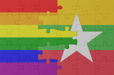 Gökkuşağı bayrağı eşcinsellik gururu ve miyanmar bulmacası. Makro. Kavram. 3d illüstrasyon