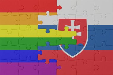 Gökkuşağı bayrağı eşcinsellik gururu ve slovakya ile bulmaca. Makro. Kavram. 3d illüstrasyon