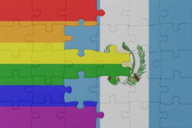 Gökkuşağı bayrağı eşcinsellik gururu ve Guatemala 'nın bulmacası. Makro. Kavram. 3d illüstrasyon