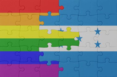 Gökkuşağı bayrağı eşcinsellik gururu ve Honduras 'ın bulmacası. Makro. Kavram. 3d illüstrasyon