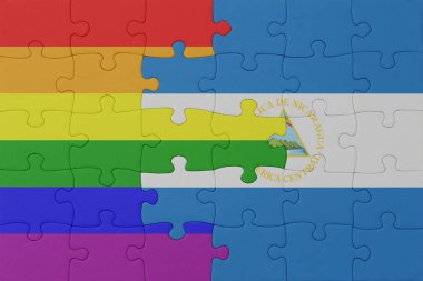 Gökkuşağı bayrağı eşcinsellik gururu ve Nikaragua 'nın bulmacası. Makro. Kavram. 3d illüstrasyon