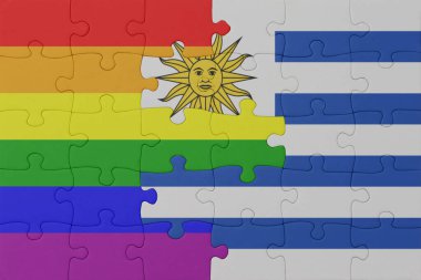 Gökkuşağı bayrağı eşcinsellik gururu ve uruguay bulmacası. Makro. Kavram. 3d illüstrasyon