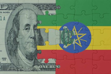 Etiyopya 'nın ulusal bayrağı ve dolar banknotuyla ilgili bulmacalar. Makro. Kavram. 3d illüstrasyon