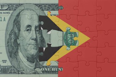 Doğu Timor 'un ulusal bayrağı ve dolar banknotunun bulmacası. Makro. Kavram. 3d illüstrasyon