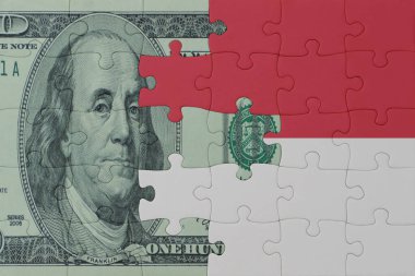 Ulusal Endonezya bayrağı ve dolar banknotuyla ilgili bulmacalar. Makro. Kavram. 3d illüstrasyon