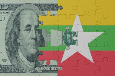 Myanmar 'ın ulusal bayrağı ve dolar banknotunun bulmacası. Makro. Kavram. 3d illüstrasyon
