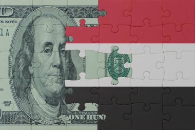Ulusal Yemen bayrağı ve dolar banknotları bulmacası. Makro. Kavram. 3d illüstrasyon