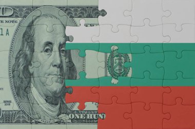 İspanya ulusal bayrağı ve dolar banknotuyla ilgili bulmacalar. Makro. Kavram. 3d illüstrasyon