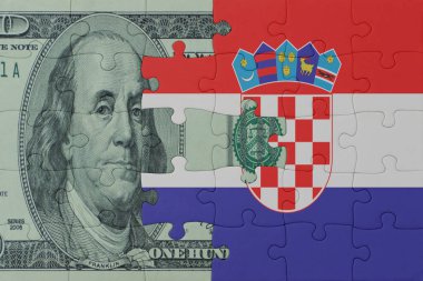 Ulusal Hırvat bayrağı ve dolar banknotuyla ilgili bulmacalar. Makro. Kavram. 3d illüstrasyon