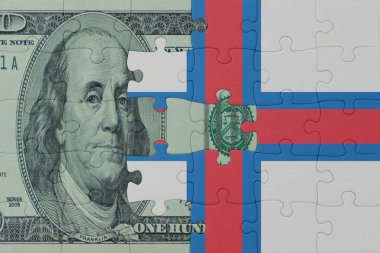 Faroe Adaları 'nın ulusal bayrağı ve dolar banknotuyla ilgili bulmacalar. Makro. Kavram. 3d illüstrasyon