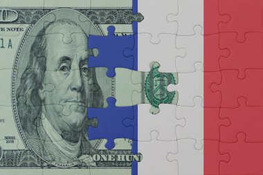 Ulusal Fransa bayrağı ve dolar banknotuyla ilgili bulmacalar. Makro. Kavram. 3d illüstrasyon
