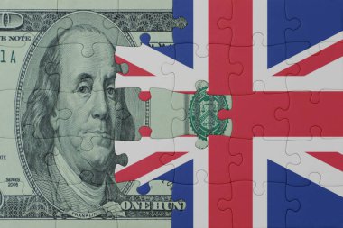 Büyük Britanya bayrağı ve dolar banknotunun bulmacası. Makro. Kavram. 3d illüstrasyon
