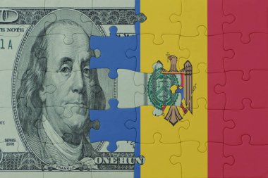 Moldova 'nın ulusal bayrağı ve dolar banknotunun bulmacası. Makro. Kavram. 3d illüstrasyon