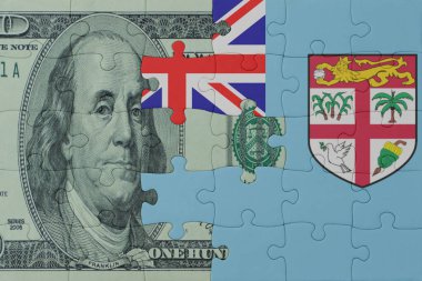 Fiji 'nin ulusal bayrağı ve dolar banknotunun bulmacası. Makro. Kavram. 3d illüstrasyon