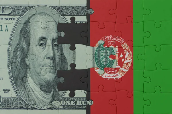 アフガニスタンの国旗とドル紙幣のパズルです マクロ コンセプト 3Dイラスト — ストック写真