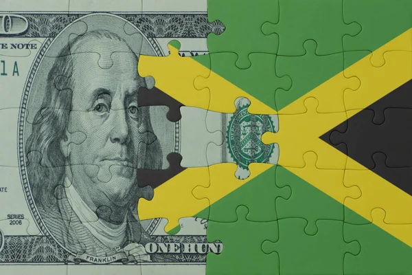 stock image puzzle with the national flag of jamaica and dollar money banknote. macro.concept. 3d illustration