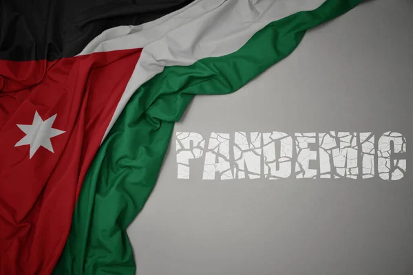 Schwenkt Bunte Jordanische Nationalflagge Auf Grauem Hintergrund Mit Gebrochenem Text — Stockfoto