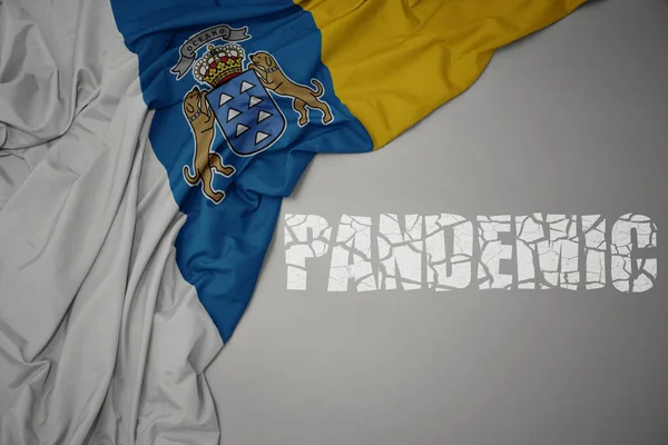 Acenando Bandeira Nacional Colorida Ilhas Canárias Fundo Cinza Com Pandemia — Fotografia de Stock