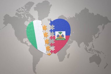 Bir dünya haritasında Haiti ve İrlanda ulusal bayrağının bulmaca kalbi. 3B illüstrasyon