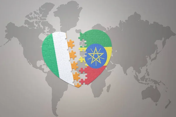 puzzle heart with the national flag of ethiopia and ireland on a world map background.Concept. 3D illustration