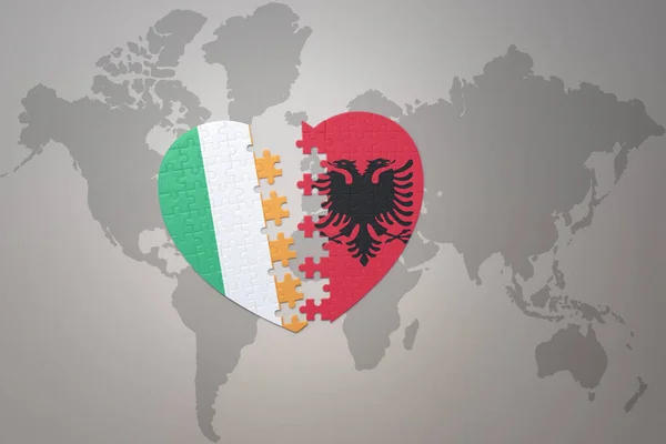 puzzle heart with the national flag of albania and ireland on a world map background.Concept. 3D illustration