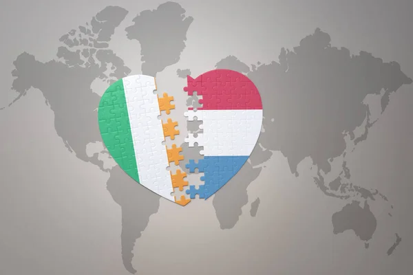 Puzzle Heart National Flag Luxembourg Ireland World Map Background Concept — Stock Photo, Image