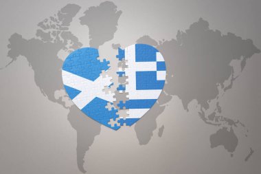 Dünya haritasında Yunanistan ve İskoçya 'nın ulusal bayrağıyla ilgili bir bulmaca kalbi. 3B illüstrasyon