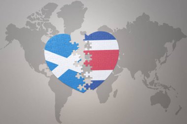 Dünya haritasında Costa Rica ve İskoçya 'nın ulusal bayrağıyla ilgili bir bulmaca kalbi. 3B illüstrasyon