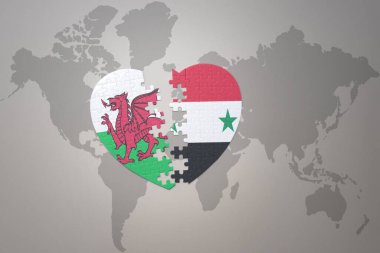 Dünya haritasında Suriye ve Galler 'in ulusal bayrağıyla ilgili bir bulmaca kalbi. 3B illüstrasyon