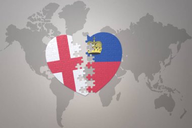 Lihtenştayn ve İngiltere 'nin ulusal bayrağını bir dünya haritasında bulmacanın kalbi. 3B illüstrasyon