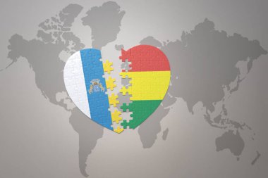Bolivya ve Kanarya Adaları 'nın ulusal bayrağıyla bir dünya haritası üzerinde bulmaca kalbi. 3B illüstrasyon