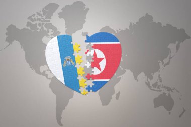 Kuzey Kore ve Kanarya Adaları 'nın ulusal bayrağıyla bir dünya haritası üzerinde bulmaca kalbi. 3B illüstrasyon